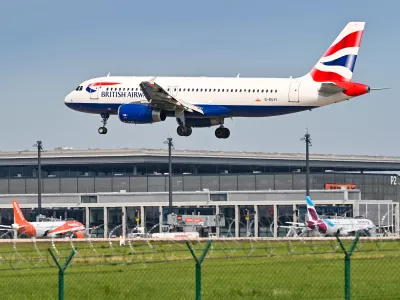 FILED - 03 May 2022, Brandenburg, Schoenefeld: A British Airways passenger aircraft lands on the southern runway of the capital's BER airport. International Airlines Group (IAG), owner of British Airways, is placing an order for dozens of Airbus planes, the company announced on Thursday in a move it says will help it reach its climate goals. Photo: Patrick Pleul/dpa