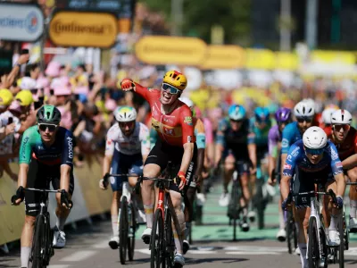 Cycling - Tour de France - Stage 11 - Vichy to Nevers - Nevers, France - July 15, 2026 Uno-X Mobility's Soren Waerenskjold celebrates winning stage 11 REUTERS/Stephanie Lecocq