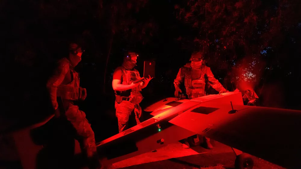 Service members of the Sparta company of the 422nd Unmanned Systems Regiment 'Luftwaffe' of the Ukrainian Armed Forces, prepare a Zozulia mid-strike drone for a flight while they work at a position near a front line, amid Russia's attack on Ukraine, in an undisclosed location in Southern Ukraine, on an undisclosed date, 2026. REUTERS/Valentyn Ogirenko