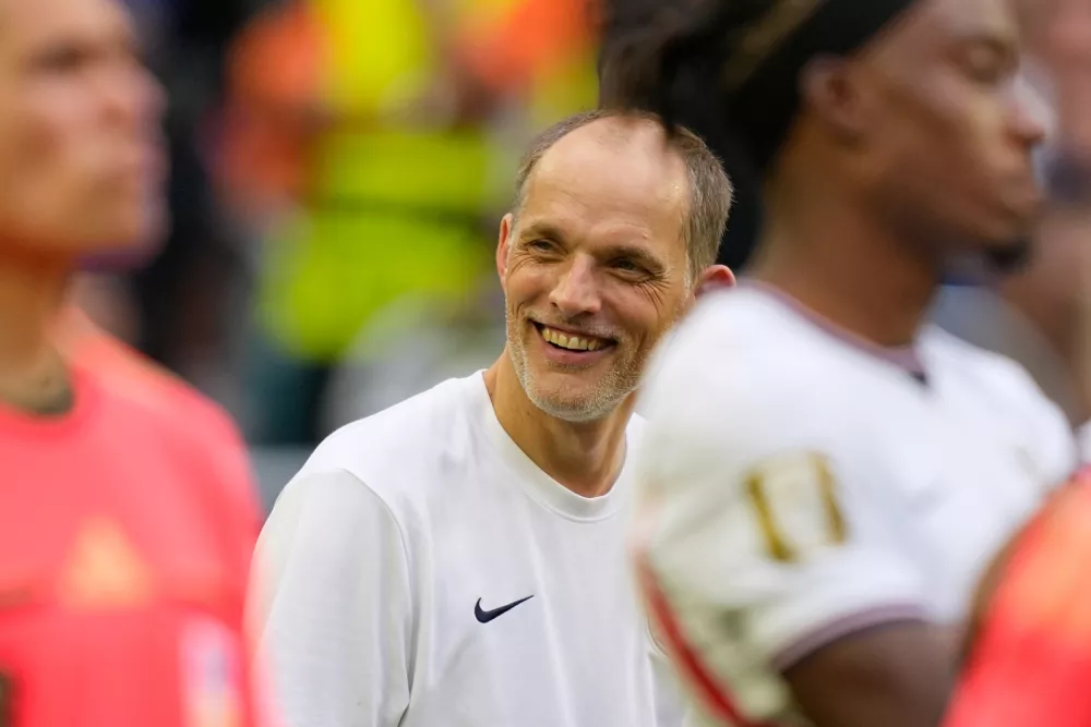 England head coach Thomas Tuchel smiles during the medal ceremony during the World Cup third-place playoff soccer match between France and England in Miami Gardens, Fla., Saturday, July 18, 2026. (AP Photo/Rebecca Blackwell)