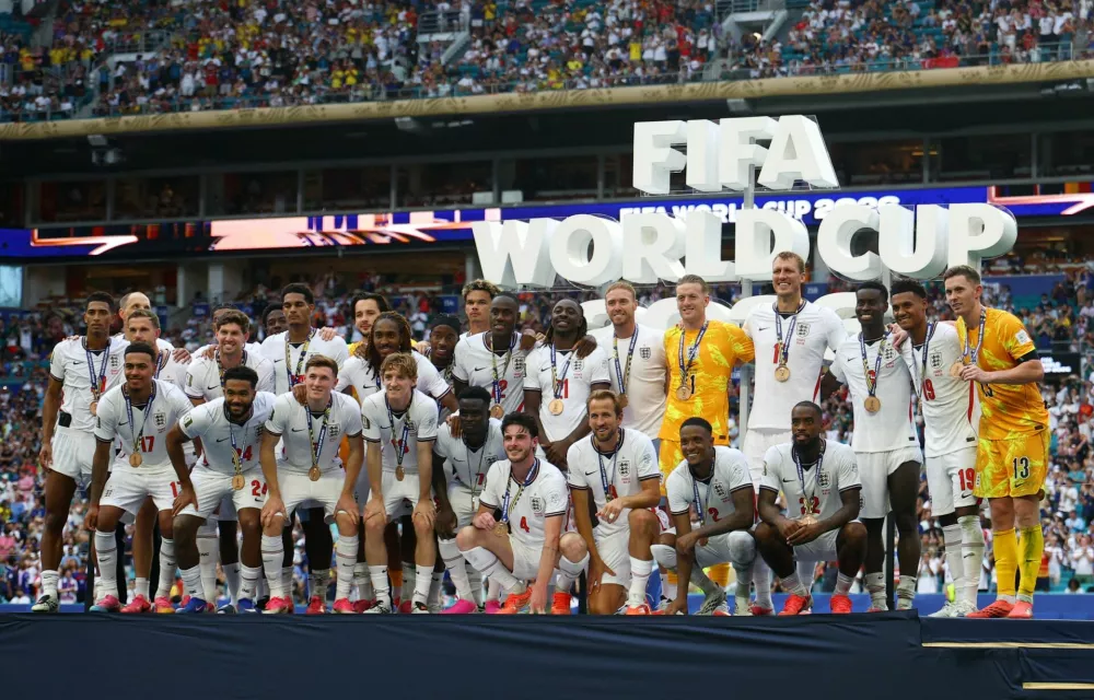 Soccer Football - FIFA World Cup 2026 - Bronze Final - France v England - Miami Stadium, Miami Gardens, Florida, U.S. - July 18, 2026 England players celebrate on the podium after winning the Bronze Final IMAGN IMAGES via Reuters/Nathan Ray Seebeck
