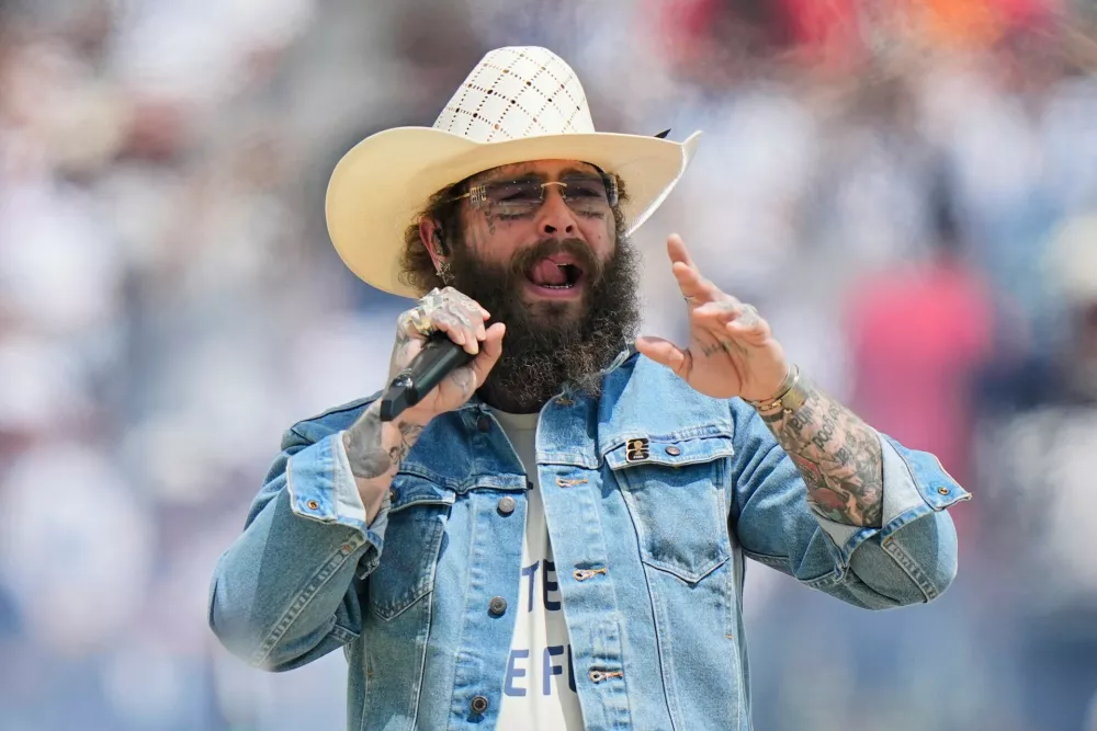 Singer Post Malone performs before the World Cup final soccer match between Spain and Argentina in East Rutherford, N.J., near New York, Sunday, July 19, 2026. (AP Photo/Frank Franklin II)