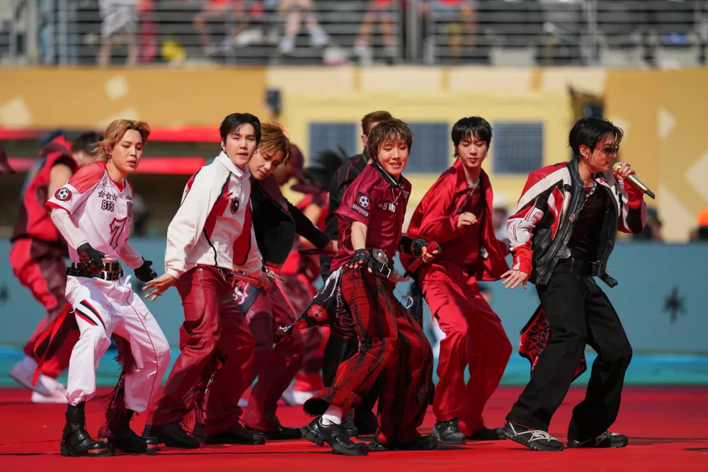BTS performs during the halftime show in the World Cup final soccer match between Spain and Argentina in East Rutherford, N.J., near New York, Sunday, July 19, 2026. (AP Photo/Julio Cortez)