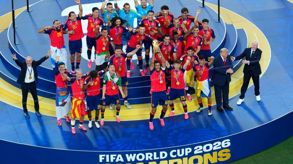 Spain players and coaches celebrate after the World Cup final soccer match between Spain and Argentina in East Rutherford, N.J., near New York, Sunday, July 19, 2026. (AP Photo/Yuki Iwamura)