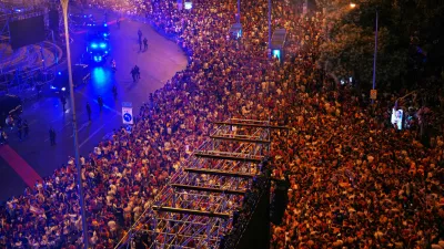 Spanish fans celebrate in central Madrid after Spain defeated Argentina in the World Cup final soccer match in East Rutherford, N.J., near New York, Sunday, July 19, 2026. (AP Photo/Manu Fernandez)