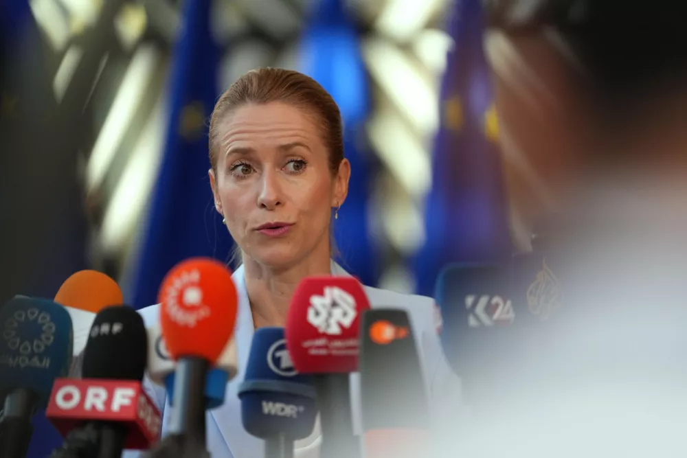 European Union foreign policy chief Kaja Kallas speaks with the media as she arrives for a meeting of EU foreign ministers in Brussels, Monday, July 13, 2026. (AP Photo/Marius Burgelman)
