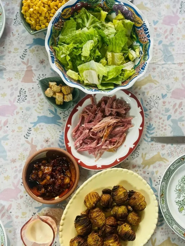 Story from Jam Press (Budget Mum Meals)Pictured: Slow-cooked gammon with leftover sweetcorn, hasselback potatoes, and a lovely (but spicy!) pineapple condiment cooked by Mette Kristiansen.'I learned how to feed my family for less than Ł6 a day as a single mum once ridden with debt &ndash; here's how I did it'A resourceful mum-of-two has revealed how she keeps her family's food and household bills to less than Ł200 a month.Mette Kristiansen says she still serves colourful, home-cooked meals and introduces her sons, Joshua, 12, and Noah, eight, to new foods despite spending far less than many families on groceries.The 42-year-old turned budget cooking into a way of life after falling into debt when her youngest son, who is autistic, was born.Determined to make every penny count, Mette began hunting for yellow-sticker bargains and getting creative in the kitchen.And now her average monthly spend on food and household essentials is just Ł174.30."When I had my youngest son, I had to give up my job which I absolutely loved and had hoped to keep for much longer, his needs meant that I couldn't simply place him in nursery," Mette, a Danish-born single mother living in Basingstoke, Hampshire, told creatorzine.com."At the same time, my relationship with my ex-husband deteriorated, and I struggled both emotionally and financially."I suddenly found myself falling into debt every month."I discovered that many supermarkets heavily discounted food at the end of the day so I would buy a random assortment of reduced items and challenge myself to turn them into enjoyable meals by thinking creatively."The purpose was to show that it is possible to create delicious, affordable meals using reduced-to-clear products."Mette, who works part-time at a local community centre, regularly transforms unusual food pantry finds into family meals and is known among friends and neighbours for rescuing unwanted food.That includes products that are past their best-before dates.She said: "I later discovered the food pantries in Basingstoke and became a regular visitor."I noticed that there were often unusual frozen items that nobody else wanted."I would take them home and find ways to reinvent them."It has been a process of trial and error, but over time it has mostly been a success."Mette shares meal plans, tips and money-saving tricks on her Facebook page, A Foodie Mum on a Budget.One recent meal showed exactly how her approach works.Using reduced-price beef, discounted vegetables, free surplus produce and pantry staples, she cooked a noodle dish for herself and her two sons for just Ł4.78.The ingredients included reduced-to-clear beef costing Ł2.74, two eggs for 36p, noodles for 59p, carrots costing 5p, mangetout at 60p, peppers for 8p, onions for 5p and a chilli topping for 15p.Several ingredients, including bok choi, cabbage, lemons and coriander, were sourced for free.There were even leftovers.Mette said: "The leftover noodles have already been requested for breakfast tomorrow morning by the boys."The price breakdowns on my posts reflect what I actually paid for ingredients."I also collect food through Olio, which I count as free."Because of the way I source much of my food, some costs are estimates, but I always try to make them as accurate as possible."This approach has also helped my boys develop a much wider range of tastes."In fact, my oldest recently tried a raw oyster."I also did a week of only using Aldi products and fed me and the boys for Ł25."It was fun to do."Though I had to think differently as I could only rely on what I got at the shop."I'm a big believer in meal planning and checking what you got in."Mette says her frugal approach helped her clear her debts and regain financial stability.She said: "Over time, I managed to clear my credit card balances and build a small emergency fund for unexpected expenses."I also wanted to be able to afford experiences for my boys."Both of them are passionate about history, so we visit historical sites and landmarks whenever we can."I'm able to do this guilt-free because I save money on our everyday food shopping."She also believes her creative cooking has helped her sons develop a healthy relationship with food.She said: "Health is another major motivation."I live with fibromyalgia and several other health conditions, and I want to be around for my two amazing boys for as long as possible."I also want them to develop a healthy relationship with food."I struggled with eating disorders throughout my teenage years, and I never want them to go through the same experience."The boys enjoys healthy and unhealthy things to eat, they don't have a massive sweet tooth, except for chocolate and macaroons."Hence, I decided to learn how to make them myself."Again it saves lots of money."Last year, I worked out that our average monthly spend on food and household essentials was just Ł174.30."Budget cooking started out as a necessity, but over the years it has become something much bigger."It helped me pay off debt, build financial security, create opportunities for my boys, and introduce my family to foods and experiences we may never otherwise have tried."Most importantly, it has shown me that good food doesn't have to be expensive."Sometimes all it takes is a bit of creativity, a willingness to try something new, and the confidence to think outside the box."ENDSEDITOR'S NOTE: Exclusive Licence: An exclusive licence has been obtained directly from the verified copyright holder. Jam Press holds exclusive distribution rights for the agreed content within the terms of the contributor agreement.,Image: 1115454876, License: Rights-managed, Restrictions: EDITOR'S NOTE: Exclusive Licence: An exclusive licence has been obtained directly from the verified copyright holder. Jam Press holds exclusive distribution rights for the agreed content within the terms of the contributor agreement., Model Release: no 