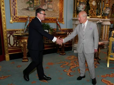 King Charles welcomes Andy Burnham during an audience at Buckingham Palace, London, where he invited the leader of the Labour Party to become Prime Minister and form a new government. Picture date: Monday July 20, 2026.  Aaron Chown/Pool via REUTERS   TPX IMAGES OF THE DAY