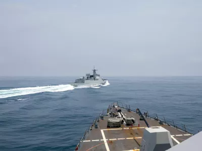 FILE PHOTO: A Chinese Luyang III class warship sails near the U.S. destroyer USS Chung-Hoon, as seen from the deck of U.S. destroyer, in the Taiwan Strait, June 3, 2023, in this handout picture. U.S. Navy/Mass Communication Specialist 1st Class Andre T. Richard/Handout via REUTERS THIS IMAGE HAS BEEN SUPPLIED BY A THIRD PARTY. MANDATORY CREDIT/File Photo