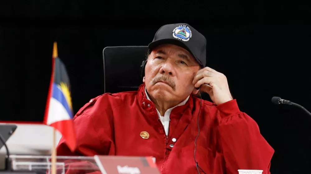 FILE PHOTO: Nicaragua's President Daniel Ortega looks on as he attends a meeting of leaders of the member states of the Bolivarian Alliance for the Peoples of Our America and the Treaty of Commerce and Promotion (ALBA-TCP), in Caracas, Venezuela December 14, 2024. REUTERS/Leonardo Fernandez Viloria/File Photo