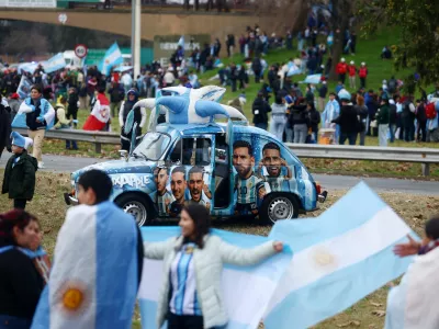 Soccer Football - FIFA World Cup 2026 - Argentina players arrive in Buenos Aires after the final - Buenos Aires, Argentina - July 20, 2026 Argentina fans gather in Buenos Aires to welcome the team home after Argentina lost the World Cup final against Spain REUTERS/Matias Baglietto