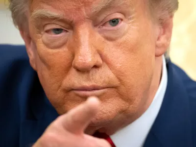 President Donald Trump gestures while meeting with Lebanese President Joseph Aoun in the Oval Office at the White House, Tuesday, July 21, 2026, in Washington. (AP Photo/Mark Schiefelbein)