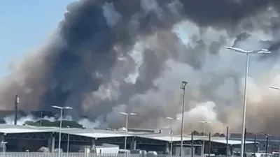 Smoke rises near the Bordeaux-Merignac Airport in France, July 21, 2026, in this screengrab obtained from a social media video. @hichem33600/via REUTERS THIS IMAGE HAS BEEN SUPPLIED BY A THIRD PARTY. MANDATORY CREDIT. NO RESALES. NO ARCHIVES. VERIFICATION: Reuters was able to verify the location through buildings, and light posts that matched satellite and archive imagery. Coordinates: 44.8311953, -0.7017427. The date was confirmed through original file metadata and corroborating media and eyewitness visuals that show the fire near the airport. Local media reported the fire broke out near the Bordeaux-Merignac Airport in France on July 21
