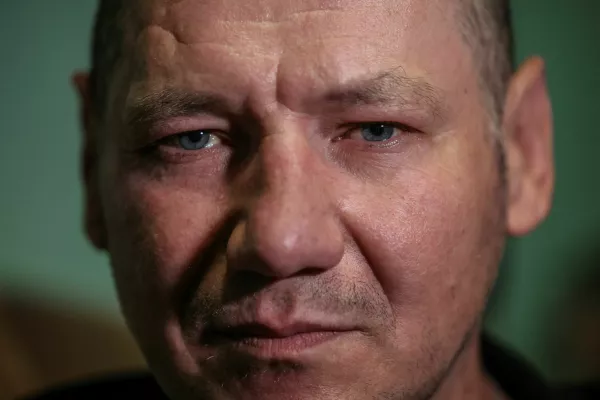 Serhii Krynitskyi, 42, a serviceman of the 24th Separate Mechanized Brigade of the Ukrainian Armed Forces, who spent 346 days at an isolated frontline position in the town of Chasiv Yar, Donetsk region, poses for a photo on his first day back on duty after recovery, amid Russia's attack on Ukraine, in the frontline city of Kramatorsk in Donetsk region, Ukraine, May 27, 2026. REUTERS/Alina Smutko