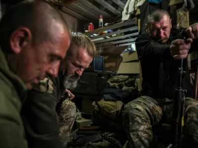 Serhii Krynitskyi, 42, a serviceman of the 24th Separate Mechanized Brigade of the Ukrainian Armed Forces, who spent 346 days at an isolated frontline position in the town of Chasiv Yar, Donetsk region, cleans an AK assault rifle on his first day back on duty after recovery, amid Russia's attack on Ukraine, in the frontline city of Kramatorsk in Donetsk region, Ukraine, May 27, 2026. REUTERS/Alina Smutko