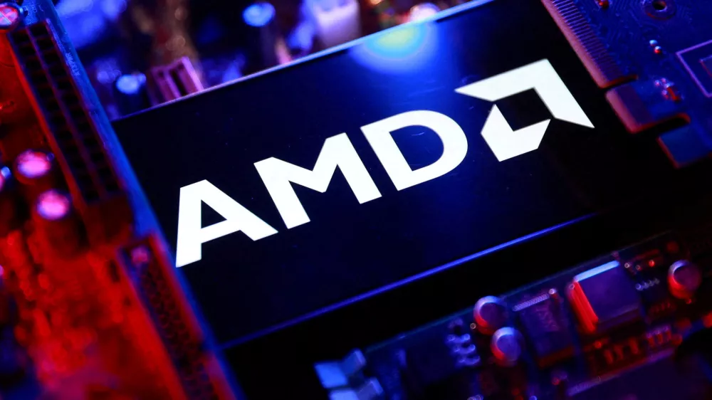FILE PHOTO: An AMD logo and a computer motherboard appear in this illustration taken August 25, 2025. REUTERS/Dado Ruvic/Illustration/File Photo/File Photo