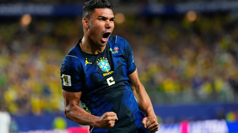 FILE - Brazil's Casemiro (5) celebrates his side's second goal by Matheus Cunha (9) during the World Cup Group C soccer match between Brazil and Haiti in Philadelphia, Friday, June 19, 2026. (AP Photo/Petr David Josek, File