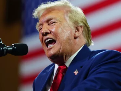 President Donald Trump speaks at Wheeler High School, Wednesday, July 22, 2026, in Marietta, Ga. (AP Photo/Julia Demaree Nikhinson)