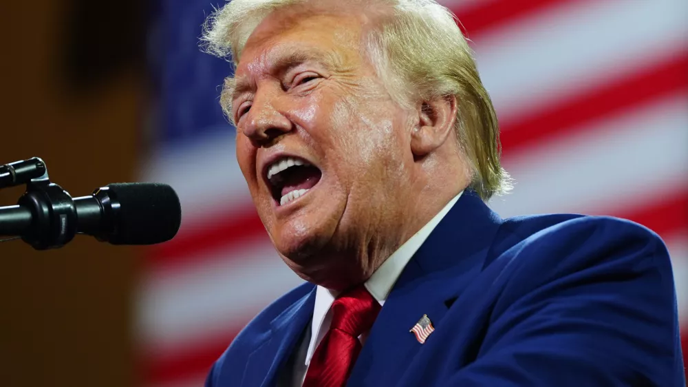President Donald Trump speaks at Wheeler High School, Wednesday, July 22, 2026, in Marietta, Ga. (AP Photo/Julia Demaree Nikhinson)