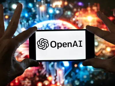 FILE - The OpenAI logo is displayed on a cell phone in front of an image generated by ChatGPT's Dall-E text-to-image model, Dec. 8, 2023, in Boston. (AP Photo/Michael Dwyer, File)