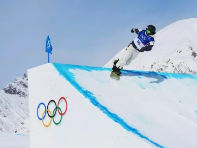 Japan's Ryoma Kimata competes during the men's snowboarding slopestyle finals at the 2026 Winter Olympics, in Livigno, Italy, Wednesday, Feb. 18, 2026. (AP Photo/Lindsey Wasson)