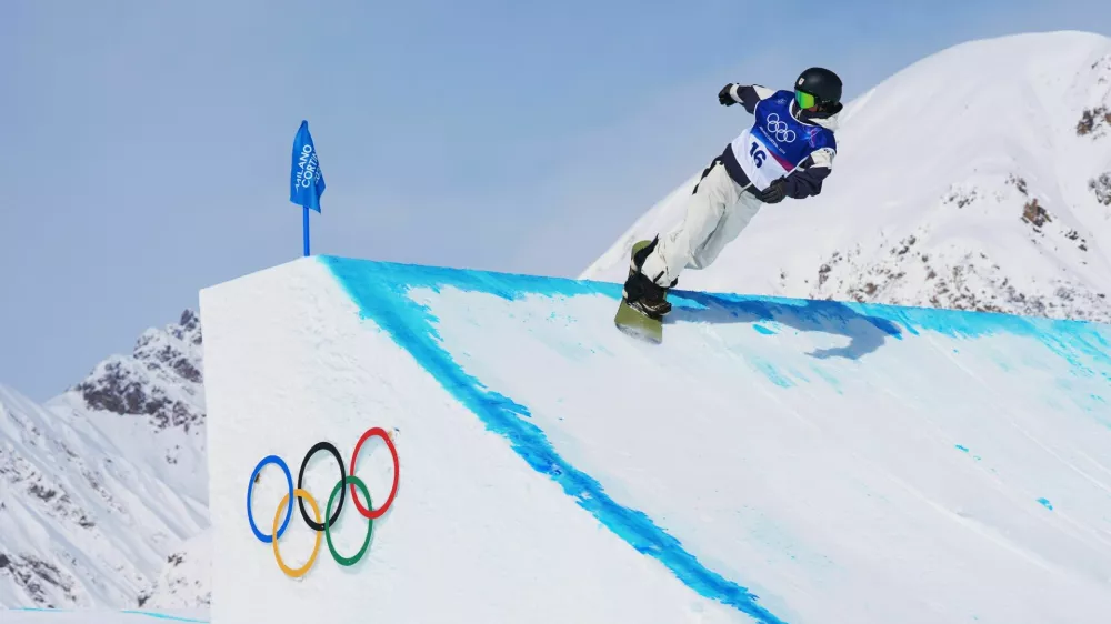 Japan's Ryoma Kimata competes during the men's snowboarding slopestyle finals at the 2026 Winter Olympics, in Livigno, Italy, Wednesday, Feb. 18, 2026. (AP Photo/Lindsey Wasson)
