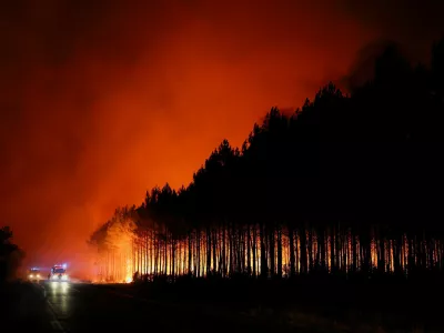 A wildfire burns in a forest area in the Gironde department amid worsening drought conditions following a heatwave and water shortages across much of France, July 22, 2026. REUTERS/Stephane Mahe