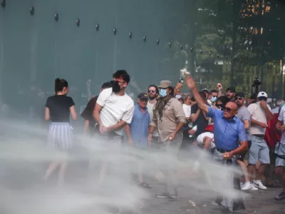 Police use water cannons against demonstrators, following weeks of protests against a planned luxury resort backed by a company linked to Jared Kushner, the son-in-law of U.S. President Donald Trump, on an environmentally sensitive part of the Adriatic coast, in Tirana, Albania, July 23, 2026. REUTERS/Florion Goga
