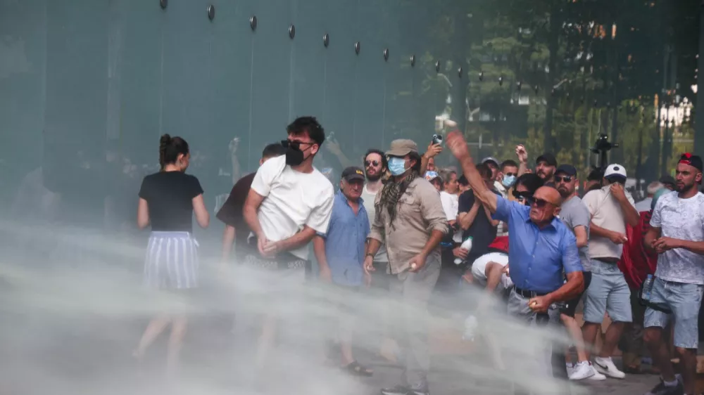 Police use water cannons against demonstrators, following weeks of protests against a planned luxury resort backed by a company linked to Jared Kushner, the son-in-law of U.S. President Donald Trump, on an environmentally sensitive part of the Adriatic coast, in Tirana, Albania, July 23, 2026. REUTERS/Florion Goga