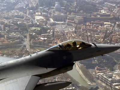 ** FILE ** In this photo released by the Italian Air Force Friday, April 8, 2005, an Italian Air Force F16 patrols the air space above St. Peter's Basilica, seen top center, at the Vatican. Italian Air Force will deploy F16 jet planes as part of the security system for the arrival in Rome of U.S. President George W. Bush scheduled for Friday, June 8, 2007. (AP Photo/Aeronautica Militare Italiana, HO)