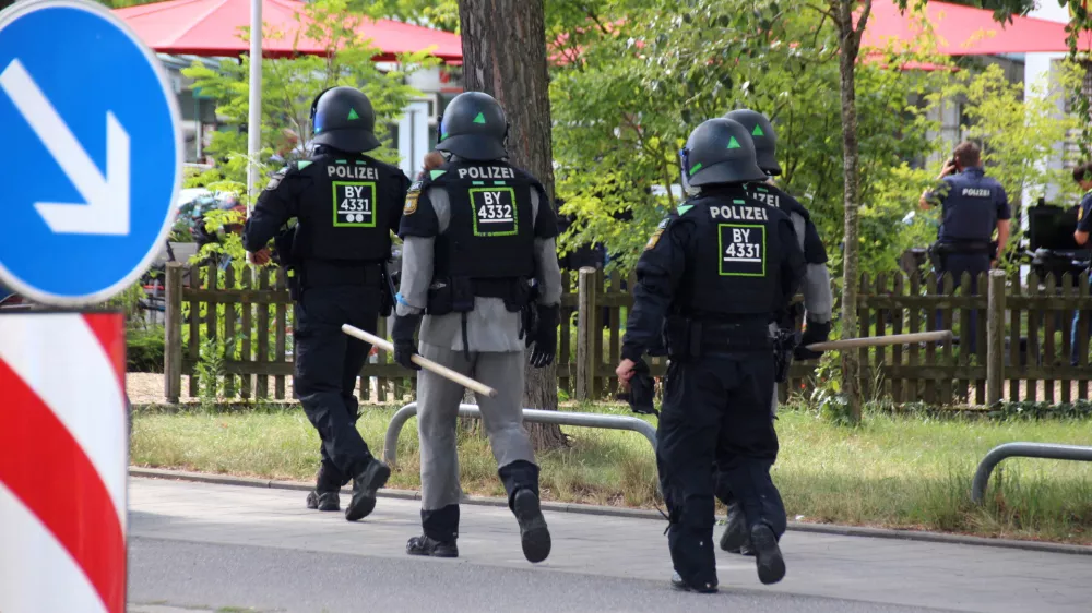 Police walks during a hostage-taking situation in a bank in Regensburg, Germany, July 23, 2026.  REUTERS/Mario Moller
