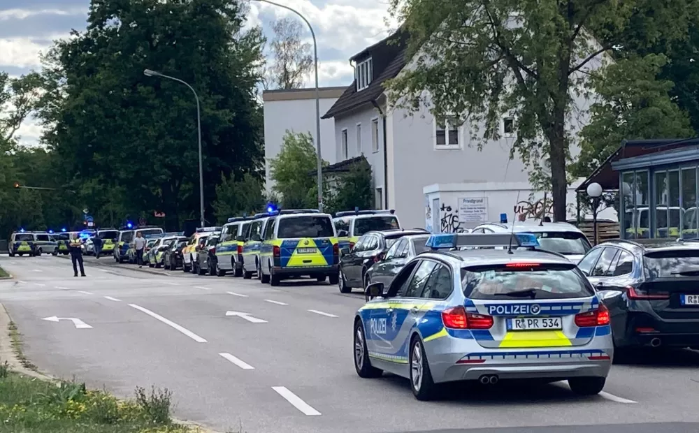 Police secures the area during a hostage-taking situation in a bank in Regensburg, Germany, July 23, 2026.  REUTERS/Mario Moller