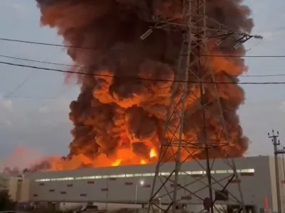 Smoke rises from a Wildberries warehouse on fire after an attack in Nevinnomyssk, Russia, July 22, 2026, in this still image obtained from social media video. Social Media/via REUTERS THIS IMAGE HAS BEEN SUPPLIED BY A THIRD PARTY. NO RESALES. NO ARCHIVES. NEWS USE ONLY.    TPX IMAGES OF THE DAY.  VERIFICATION: - Building exterior, utility poles and towers, and road layout matched archive and satellite imagery. - Corroborating footage showed smoke rising from the same location. - The governor of Stavropol region Vladimir Vladimirov said on Telegram on July 22 that a drone attack on the outskirts of Nevinnomyssk resulted in fire in a warehouse complex. - Tatyana Kim, the head and co-founder of Wildberries, posted on Telegram on July 22 that the company's logistic centers in Krasnodar and Nevinnomyssk were attacked. - No older versions of the video found posted online before July 22.