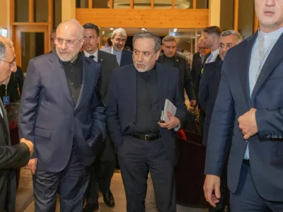 Minister of Foreign Affairs of Iran, Seyyed Abbas Araghchi, centre, and Speaker of the Islamic Parliament of Iran, Mohammad Bagher Ghalibaf, left, at the Buergenstock resort in Obbuergen, near Lucerne, Switzerland, Sunday, June 20, 2026.  URS FLUEELER/Pool via REUTERS