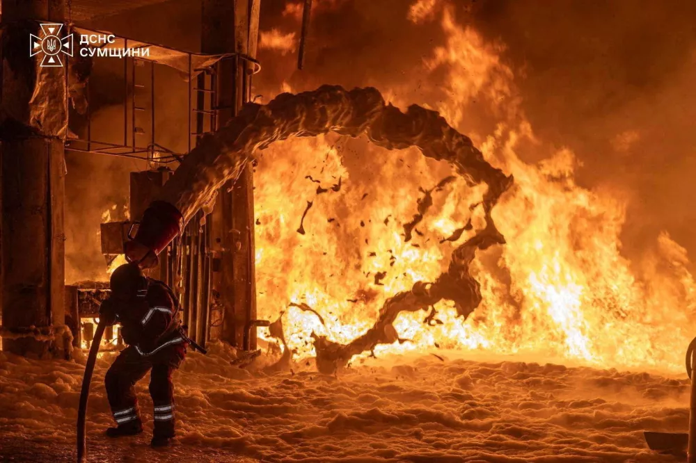 A firefighter works at the site of a petrol station hit by a Russian drone strike, amid Russia's attack on Ukraine, in Sumy, Ukraine, in this handout picture released July 23, 2026. Press service of the State Emergency Service of Ukraine/Handout via REUTERS ATTENTION EDITORS - THIS IMAGE HAS BEEN SUPPLIED BY A THIRD PARTY. DO NOT OBSCURE LOGO.    TPX IMAGES OF THE DAY