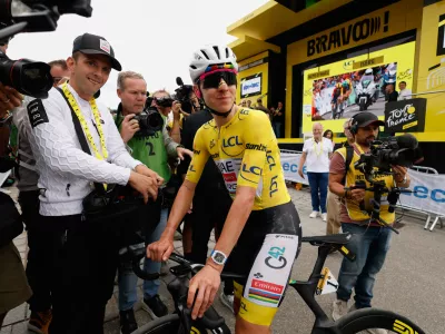 Slovenia's Tadej Pogacar looks on after the twentieth stage of the Tour de France cycling race with start in Le Bourg d'Oisans and finish in Alpe d'Huez, France, Saturday, July 25, 2026. (Yoan Valat/Pool Photo via AP)
