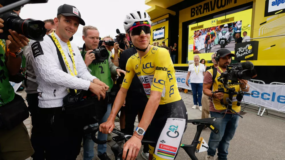 Slovenia's Tadej Pogacar looks on after the twentieth stage of the Tour de France cycling race with start in Le Bourg d'Oisans and finish in Alpe d'Huez, France, Saturday, July 25, 2026. (Yoan Valat/Pool Photo via AP)
