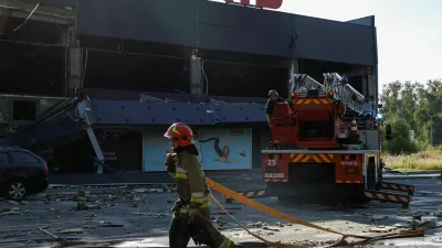 Firefighters work at the site of a supermarket hit by a Russian drone strike, amid Russia's attack on Ukraine, in Chernihiv, Ukraine July 26, 2026. REUTERS/Maksym Kishka