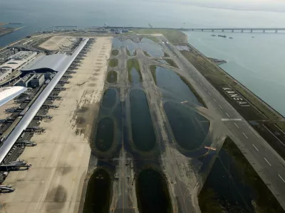 An aerial view shows a flooded runway at Kansai airport, which is built on a man-made island in a bay, after Typhoon Jebi hit the area, in Izumisano, western Japan, in this photo taken by Kyodo September 5, 2018. Mandatory credit Kyodo/via REUTERS ATTENTION EDITORS - THIS IMAGE WAS PROVIDED BY A THIRD PARTY. MANDATORY CREDIT. JAPAN OUT. NO COMMERCIAL OR EDITORIAL SALES IN JAPAN.