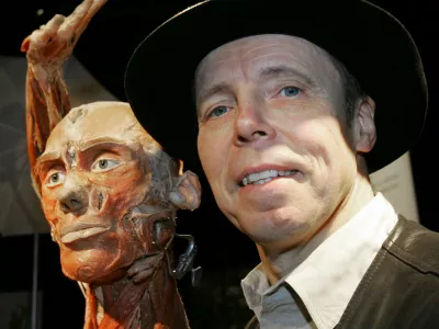 FILE - German Gunther von Hagens poses with a display from "Body Worlds" anatomy exhibit that puts real human specimens on show in Dallas, Texas, Jan. 23, 2007. (AP Photo/LM Otero, File)