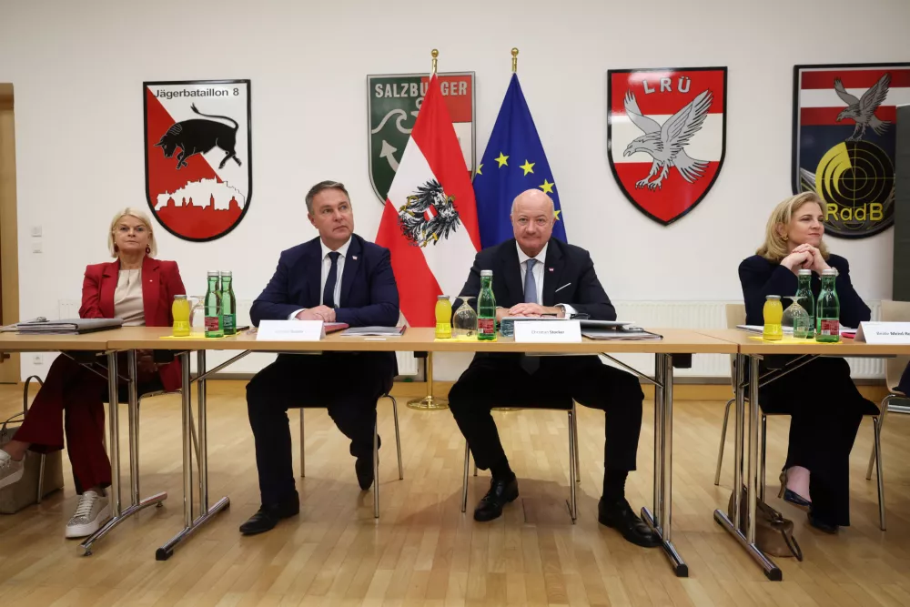 Austrian Defence Minister Klaudia Tanner, Vice Chancellor Andreas Babler, Chancellor Christian Stocker and Foreign Minister Beate Meinl-Reisinger wait for the start of the summer cabinet meeting in Salzburg, Austria, July 27, 2026. REUTERS/Leonhard Foeger