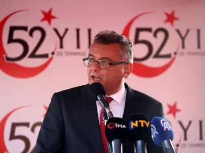 Turkish Cypriot leader Tufan Erhurman delivers a speech during a military parade to mark the 1974 Turkish invasion of Cyprus in response to a short-lived Greek-inspired coup, in the Turkish-controlled northern Cyprus, in the divided city of Nicosia, Cyprus July 20, 2026. REUTERS/Yiannis Kourtoglou