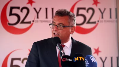 Turkish Cypriot leader Tufan Erhurman delivers a speech during a military parade to mark the 1974 Turkish invasion of Cyprus in response to a short-lived Greek-inspired coup, in the Turkish-controlled northern Cyprus, in the divided city of Nicosia, Cyprus July 20, 2026. REUTERS/Yiannis Kourtoglou