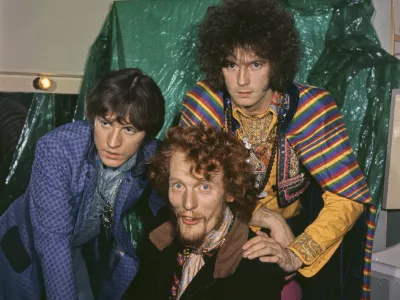 British rock group Cream posed backstage in London circa May 1967. Members of the band are, from left, bassist and vocalist Jack Bruce (1943-2014), drummer Ginger Baker (1939-2019) and guitarist Eric Clapton. (Photo by Ron Howard/Popperfoto via Getty Images)