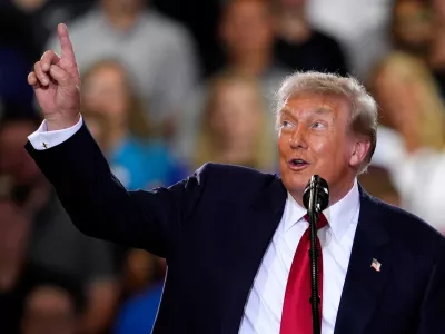 President Donald Trump speaks at an event at the General Motors Proving Ground Monday, July 27, 2026, in Milford, Mich. (AP Photo/Paul Sancya)