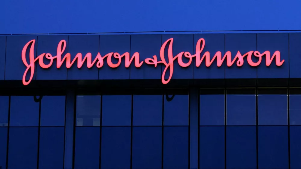 FILE PHOTO: The logo of Johnson & Johnson is seen on the top of a Brussels' office of the company in Diegem, Belgium September 21, 2023. REUTERS/Yves Herman/File Photo