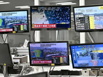 Television screens in Osaka, western Japan, show news of an earthquake with a preliminary magnitude of 7.1, which, according to the Japan Meteorological Agency, struck Japan's southern Kumamoto prefecture, July 28, 2026. Kyodo/via REUTERS ATTENTION EDITORS - THIS IMAGE HAS BEEN SUPPLIED BY A THIRD PARTY. MANDATORY CREDIT. JAPAN OUT. NO COMMERCIAL OR EDITORIAL SALES IN JAPAN.