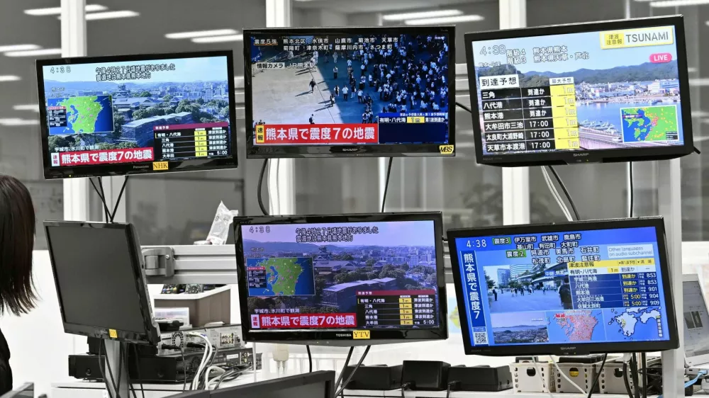Television screens in Osaka, western Japan, show news of an earthquake with a preliminary magnitude of 7.1, which, according to the Japan Meteorological Agency, struck Japan's southern Kumamoto prefecture, July 28, 2026. Kyodo/via REUTERS ATTENTION EDITORS - THIS IMAGE HAS BEEN SUPPLIED BY A THIRD PARTY. MANDATORY CREDIT. JAPAN OUT. NO COMMERCIAL OR EDITORIAL SALES IN JAPAN.