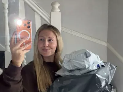 Story from Jam Press (Clothes Shipping Hack)Pictured: Beth with Vinted parcels in UK.VIDEO: Brit living in Australia shares clever trick that lets her ship her wardrobe from the UK for the price of a coffeeA Brit living in Australia has shared the clever hack she uses to get her favourite clothes shipped over for just Ł4.Beth Hackman left the UK with just an 80 litre back pack but once she'd settled, she realised she needed a much more practical wardrobe for the Australian winter and her new job.Rather than splashing out on brand-new clothes, the 25-year-old came up with an ingenious solution after spotting that second-hand marketplace Vinted had launched in Australia.With the help of mum Mel, 48, she was able to get 8kg of clothes shipped from thousands of miles away."I was going to buy new but didn't want to spend the money when I could literally picture what I wanted to wear from my own wardrobe," Beth, from Windsor, Berkshire, told creatorzine.com."It's also more sustainable."I saw an advert online that Vinted was being rolled out in Australia so I searched for my mum's account and realised I could buy things from the UK."Instead of paying more than Ł150 for international luggage shipping, Beth created a new email address because her old one was linked to her UK Vinted account, and registered with an Australian mobile number.While on FaceTime together, her mum listed bundles of Beth's own clothes on her UK Vinted account for just Ł1 each. Beth then purchased the bundles herself through her Australian account.Because Vinted is currently offering free shipping as part of its Australian rollout, Beth paid just Ł1 (.76) per parcel in fees.She split her belongings across four parcels due to the platform's 2kg weight limit, meaning it cost her around Ł4 in total to send roughly 8kg of clothing, shoes and jackets halfway across the world.The parcels arrived just nine days later, allowing Beth to reunite with the clothes she had left behind.Physiotherapist Beth said: "Normal shipping for a suitcase or box is over Ł150 for a decent amount and it would take a while."I have about 8kg in total of clothes, shoes and jackets."It's mainly my gym sets that I wanted.""This is the first time I've done it as it's just been rolled out, but I've got all my friends and boyfriend to do it too."It was mainly my own idea, I'm fairly good at finding a bargain and was so into using Vinted at home."I've made over Ł3,000 in sales."Beth moved to Sydney in March in search of better job opportunities and the chance to travel.She has since shared the hack on TikTok and the video has racked up more than 86,000 likes, and followers have praised the money-saving idea.One person said: "Delete this sis. Vinted is about to take away their free postage."Someone else said: "I was wondering when people would cotton on to this. I mentioned to my friend in USA to do the same - only costs Ł5 - Ł10 for postage."A third person added: "Girl, you're living in the year 3000, love this hack."Another commentor said: "I use Vinted all the time to send parcels to friends. It is so much cheaper."A fifth person added: "Oh my God, what an absolute hack. I miss my clothes more than anything."ENDSEDITOR'S NOTE: Non-Exclusive Licence: A non-exclusive licence has been obtained directly from the verified copyright holder. The copyright holder retains the ability to license the content elsewhere.,Image: 1116271072, License: Rights-managed, Restrictions: EDITOR'S NOTE: Non-Exclusive Licence: A non-exclusive licence has been obtained directly from the verified copyright holder. The copyright holder retains the ability to license the content elsewhere., Model Release: no 