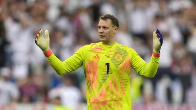 FILE - Germany's goalkeeper Manuel Neuer reacts during a quarter final match between Germany and Spain at the Euro 2024 soccer tournament in Stuttgart, Germany, Friday, July 5, 2024. (AP Photo/Matthias Schrader, File)